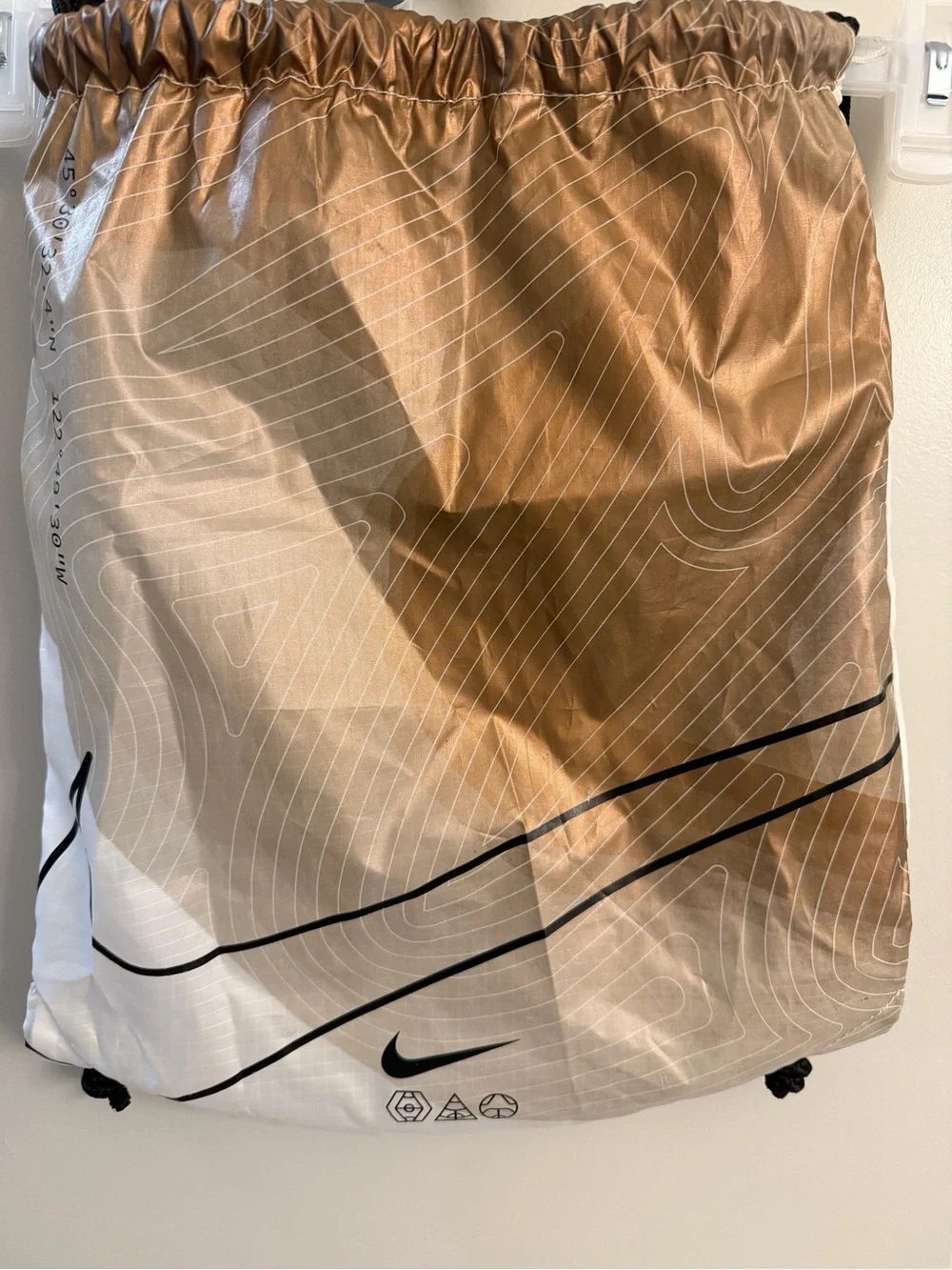 Nike Bronze, White and Black Drawstring Backpack